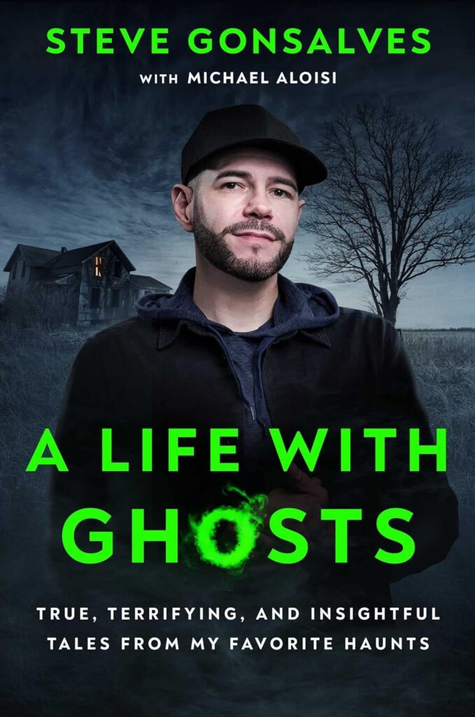 This image is the dust jacket for "A Life with Ghosts." It has the title in a green font, the word ghosts is whispy as if written with smoke. Steve Gonsalves is on the cover, standing in front of a seemingly haunted house and a tree with no leaves.